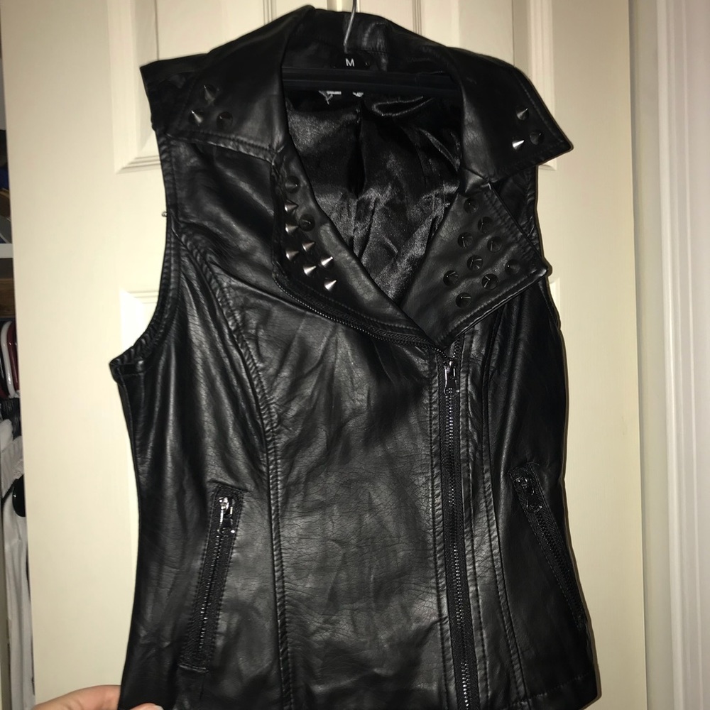 Black studded leather vest